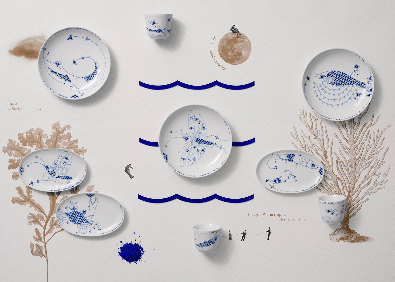 Royal Creatures plates and mugs lying on a table with drawings of inspirations from the ocean and the three blue waves